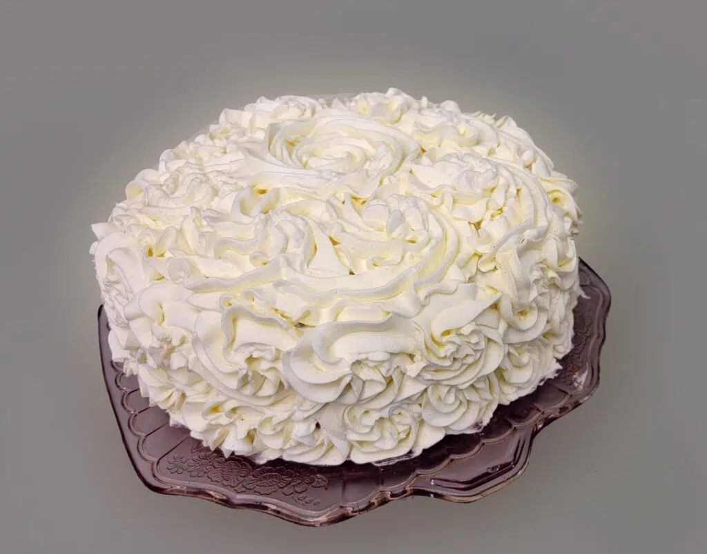 carrot cake with whipped cream cheese frosting