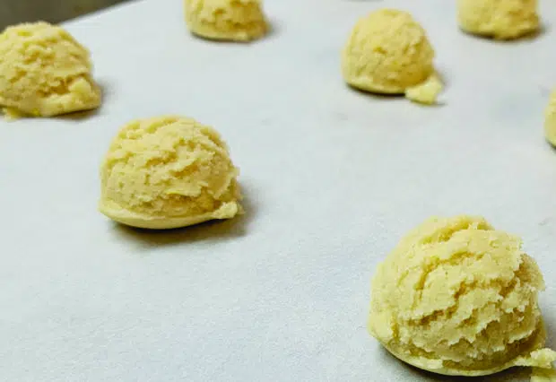 scooped dough on a sheet pan