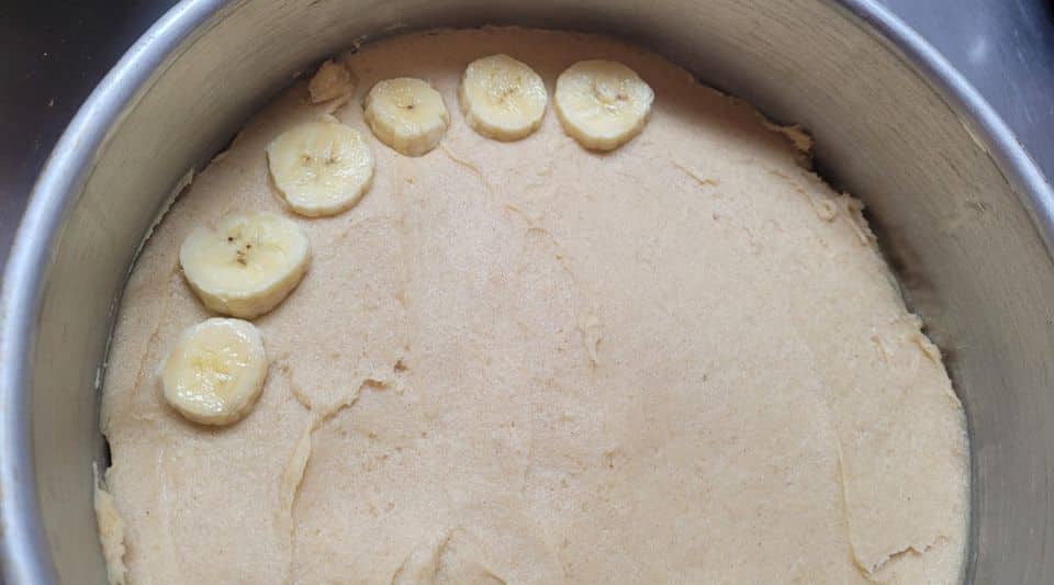 assembling bananas in banana rum pound cake