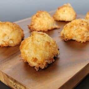 coconut macaroons on a wooden platter