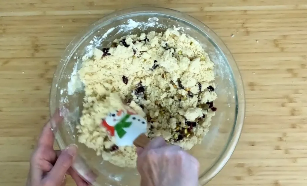 mixing cranberry pistachio cookie dough