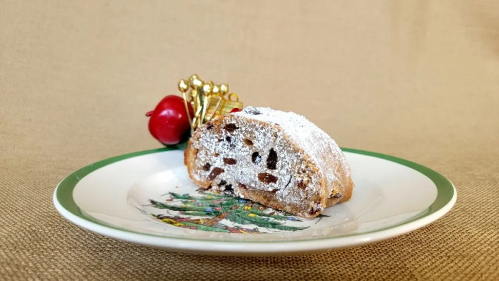 slice of Stollen bread on Christmas plate