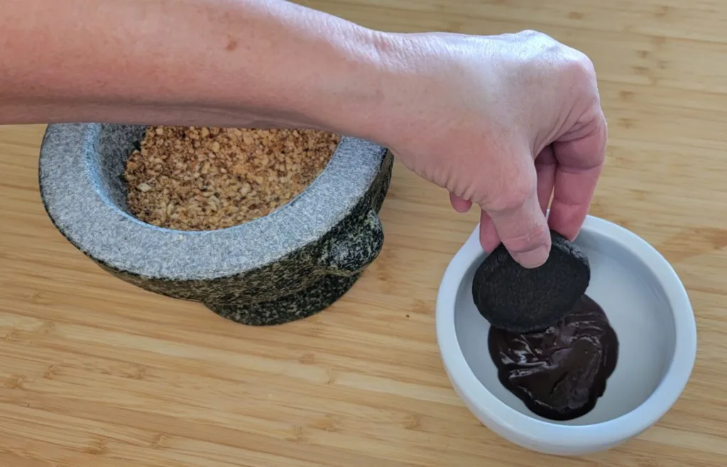 dipping baked cookies in chocolate