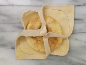 start folding pastry for apple puff pastries