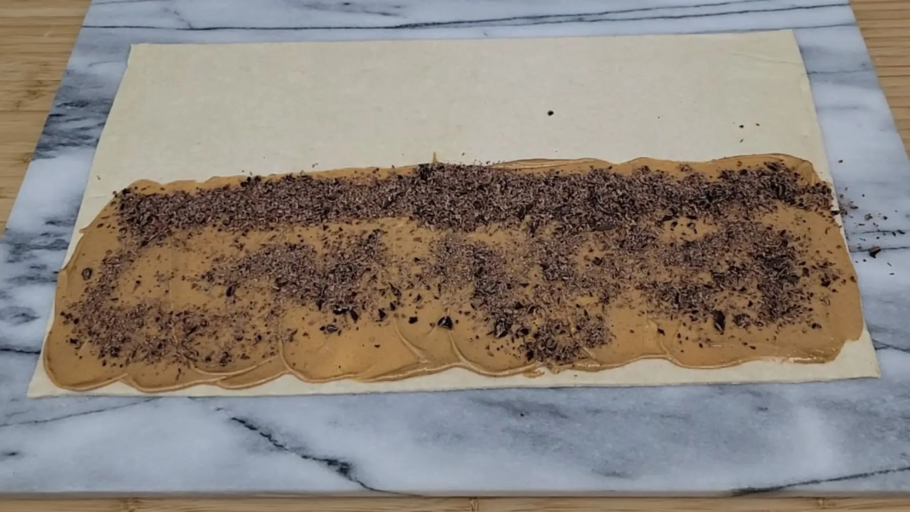 puff pastry with chocolate and peanut butter spread evenly