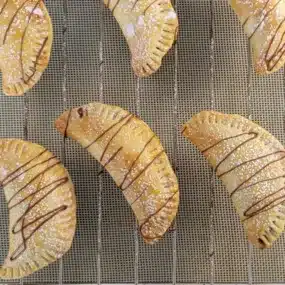 dessert empanadas on baking tray