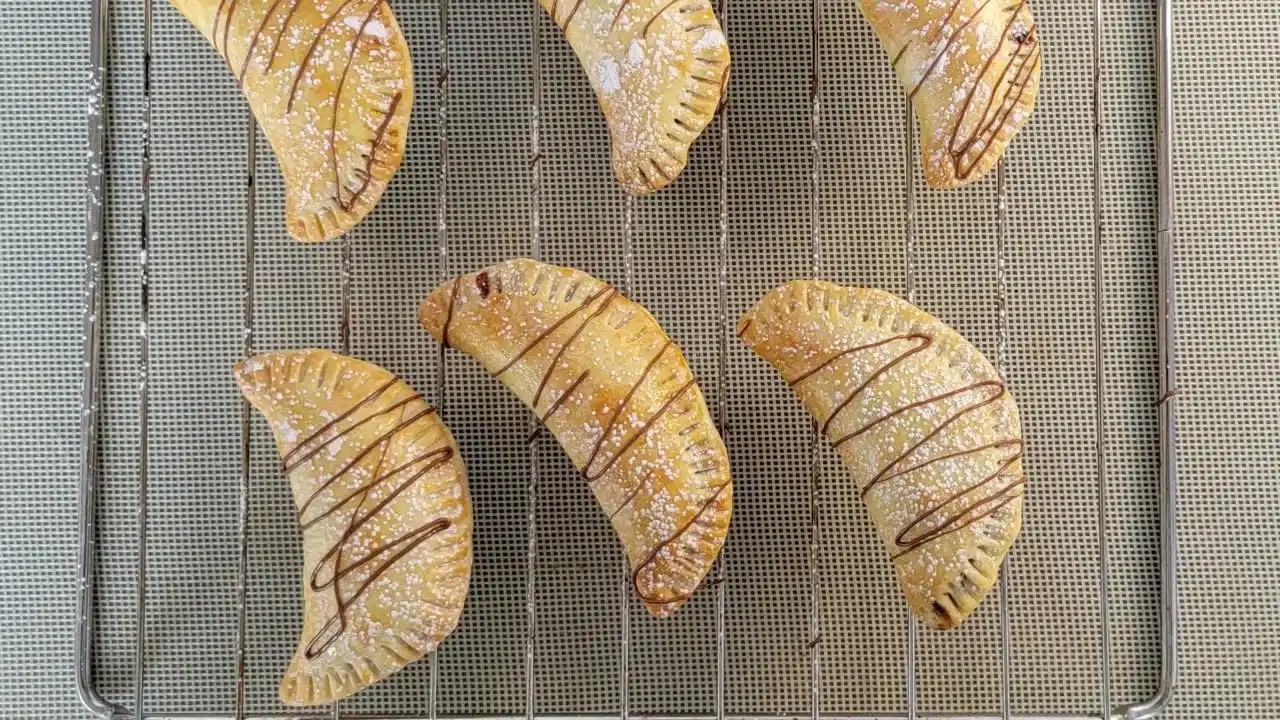 dessert empanadas on baking tray
