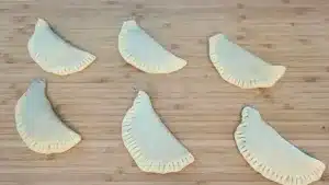 how to seal empanada shells