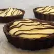 banana cream individual tarts in a chocolate crust