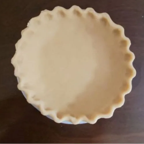 sweet pie dough in a pie pan