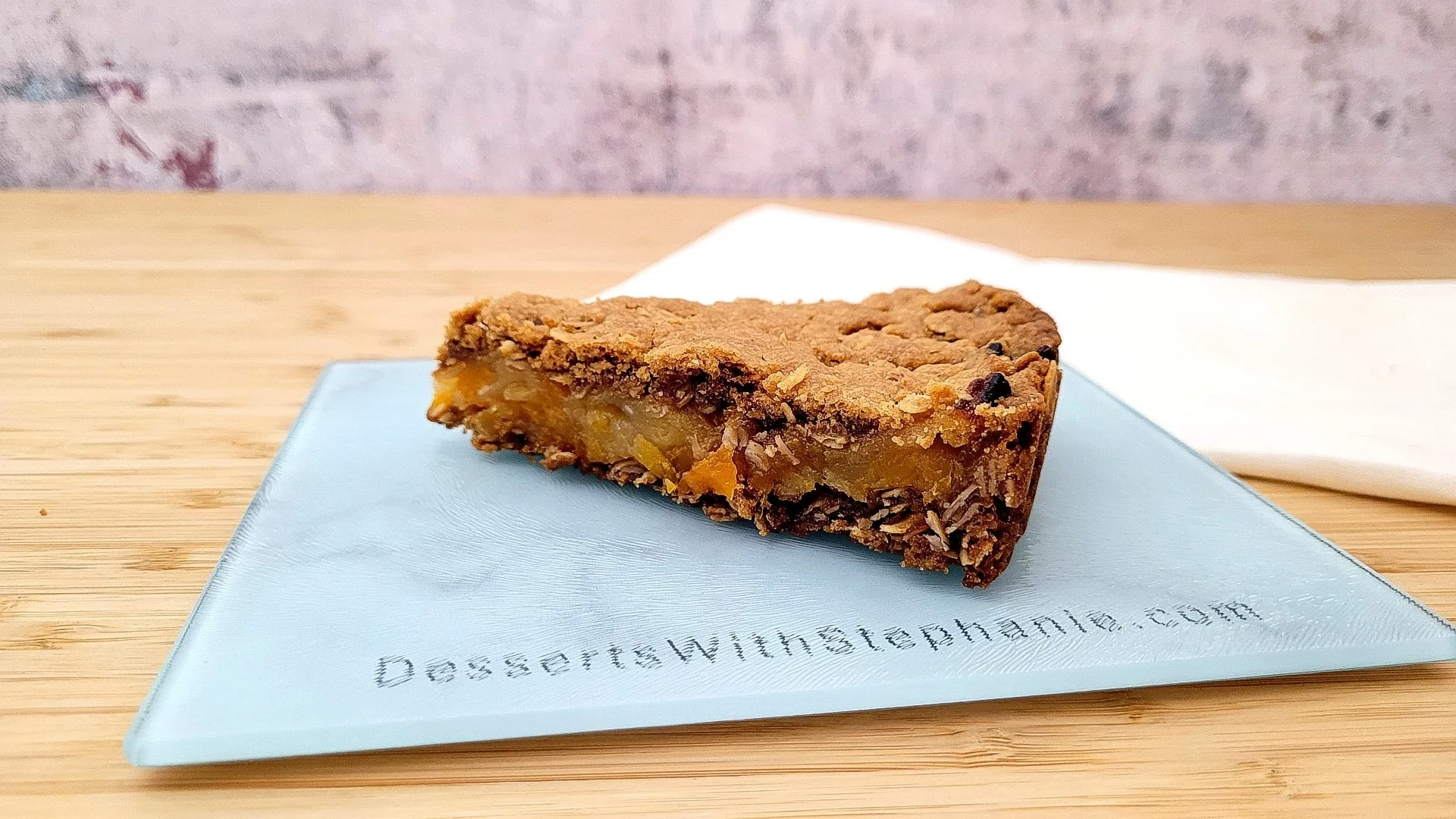 slice of vegan cookie bar with apricots