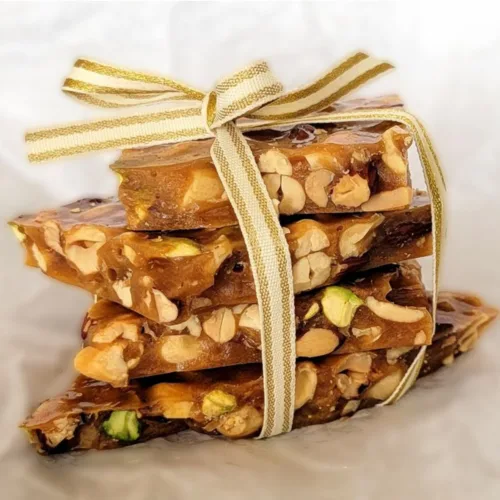 pieces of nut brittle tied with a bow