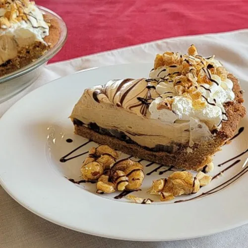 slice of chocolate peanut butter pie on a plate