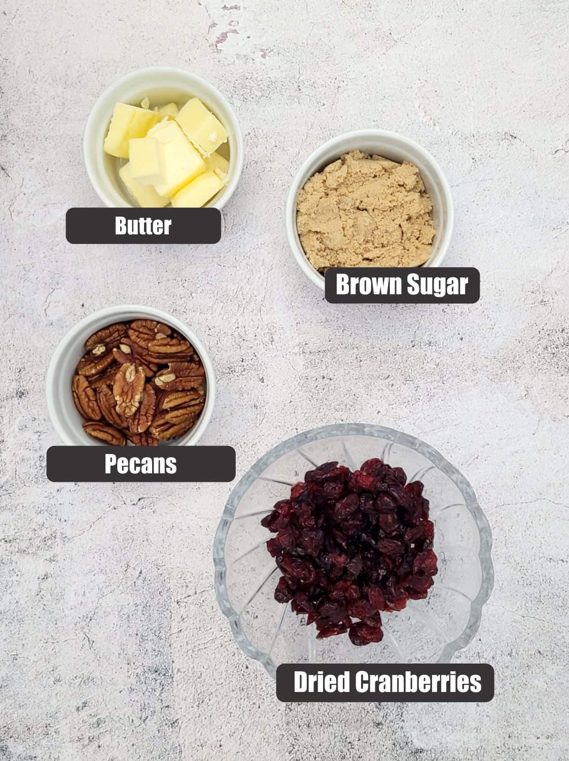 ingredients need to make the dried cranberry and pecan cake topping