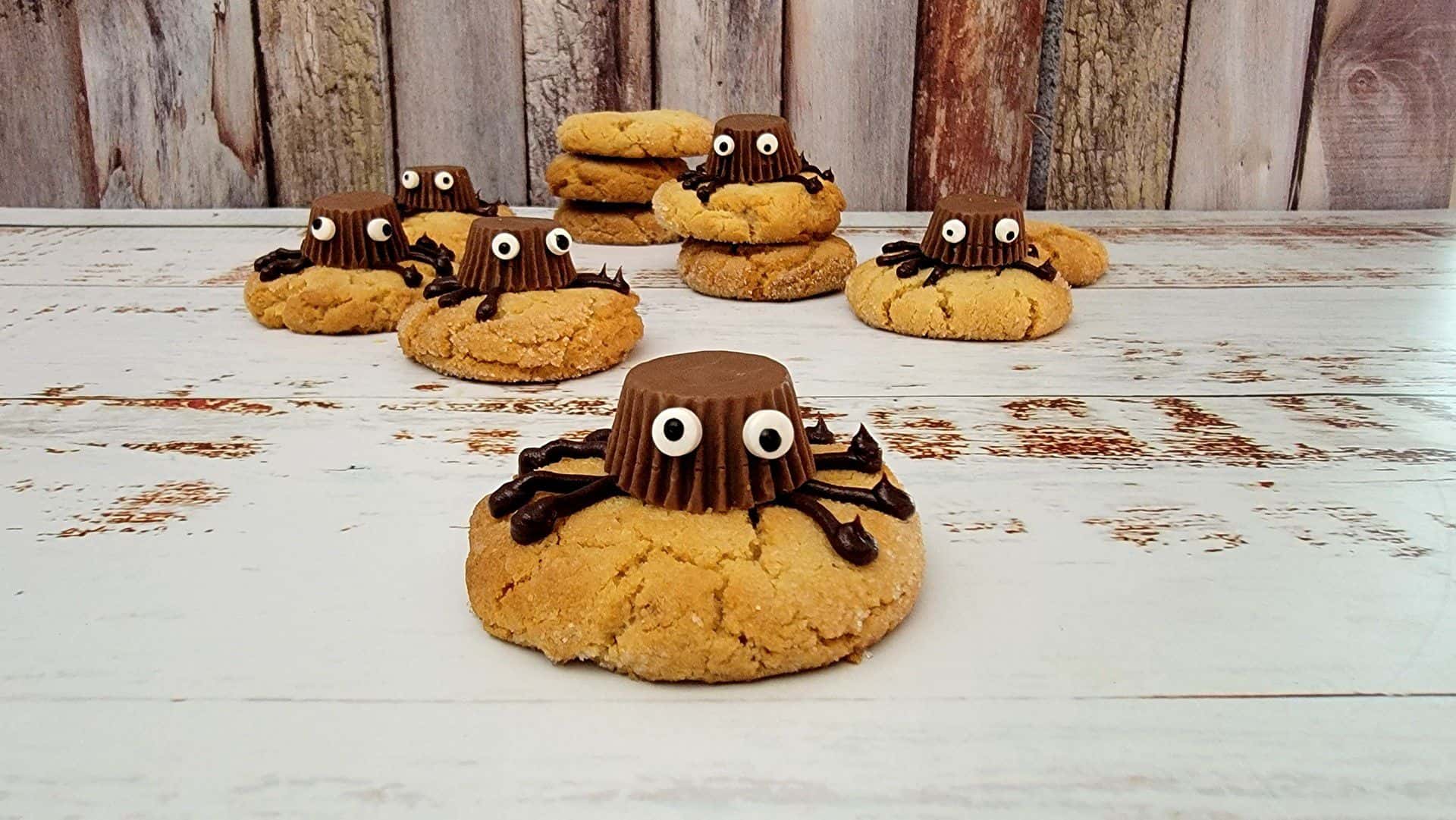 peanut butter cookies with a Resee's peanut butter cup spider