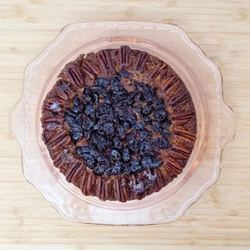 overhead view of an upside down pecan cranberry cake