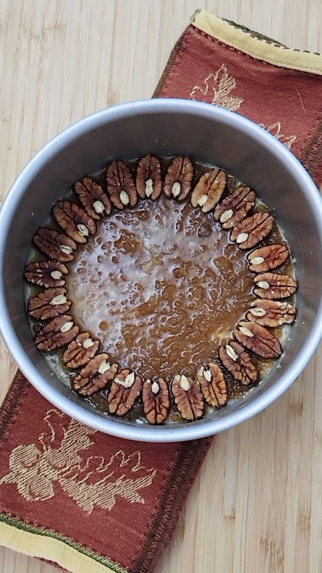 cake pan with pecans on outer edge
