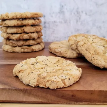 stack of crispy coffee cookies on a wood platter