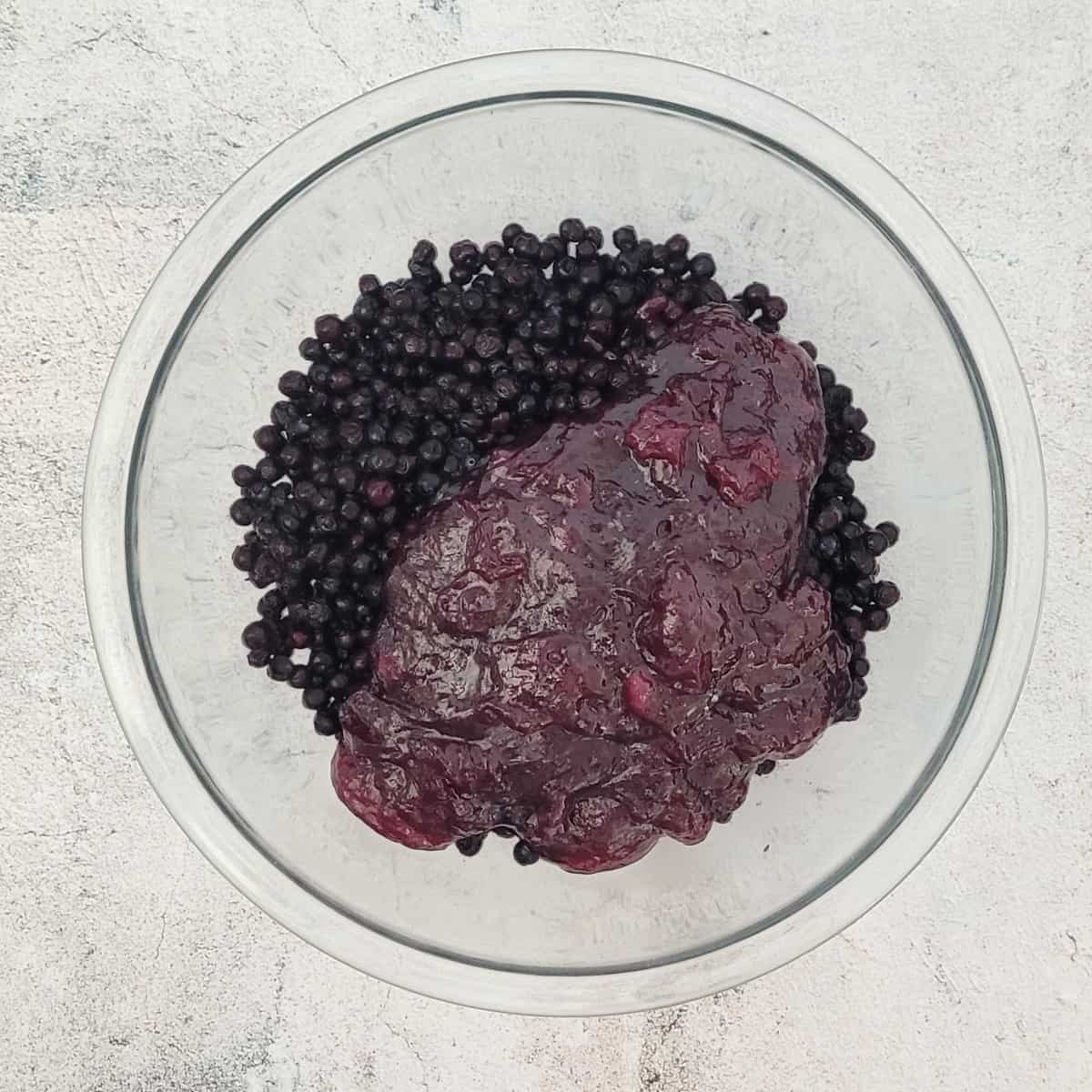 blueberries and pie slurry in a glass bowl