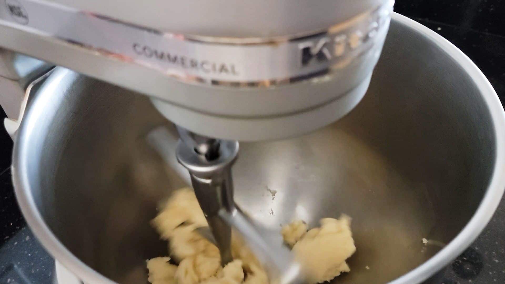 dough paste in mixing bowl before adding eggs to make cream puffs