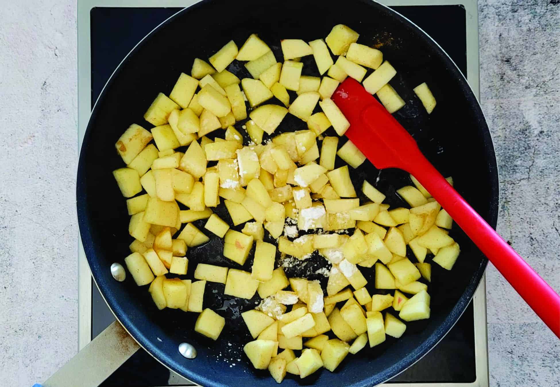 chopped apples in a saucepan with cornstarch added