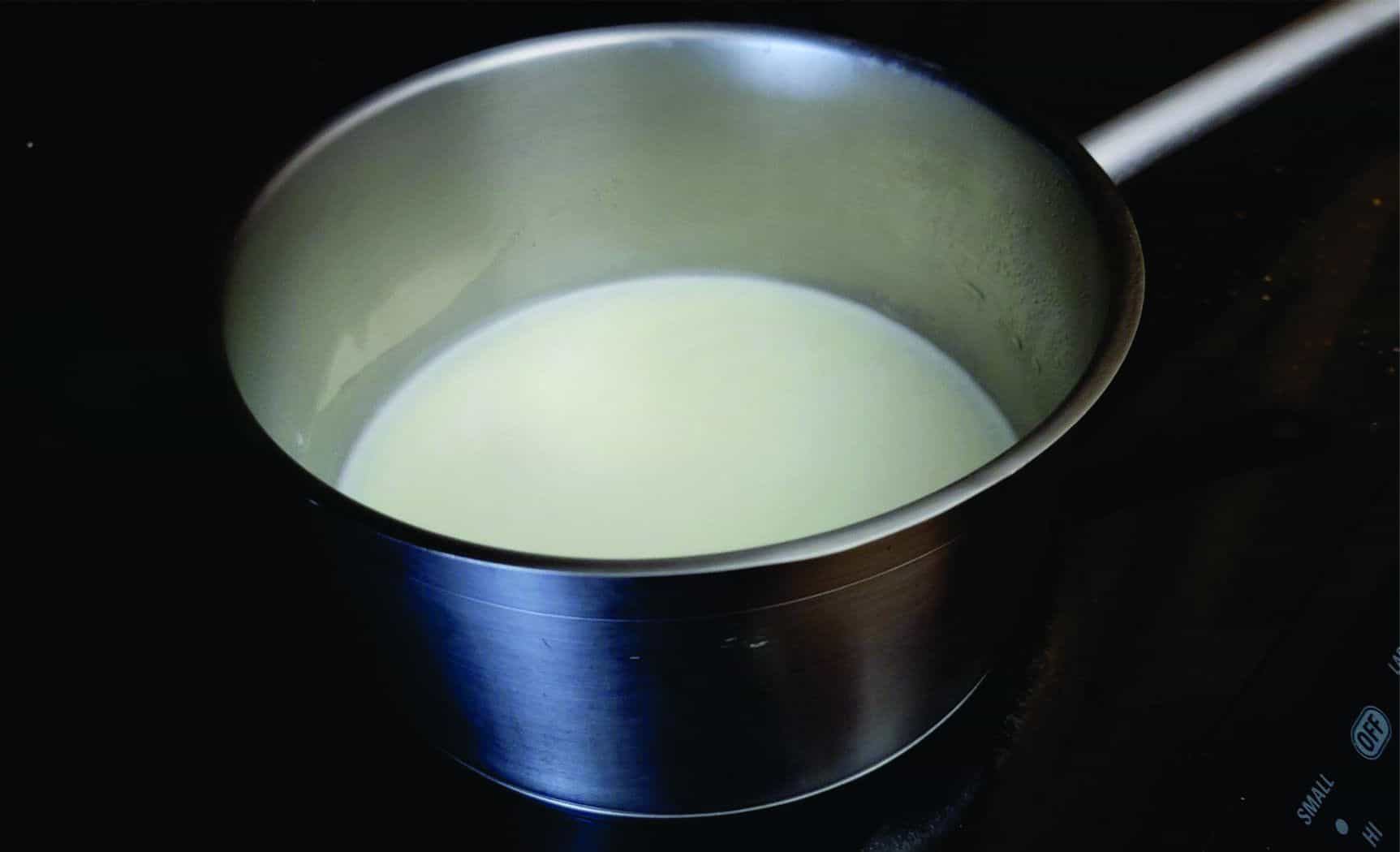 boiling milk and sugar in a saucepan