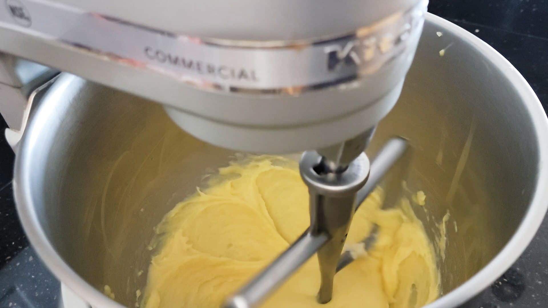 pate a choux in a stand mixer bowl with paddle attachment