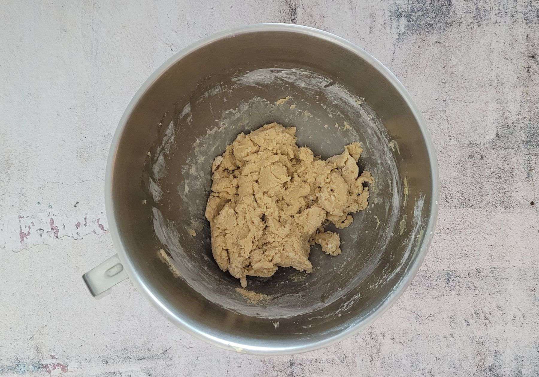 mixing bowl for chocolate chunk cookies after adding the gluten free flour