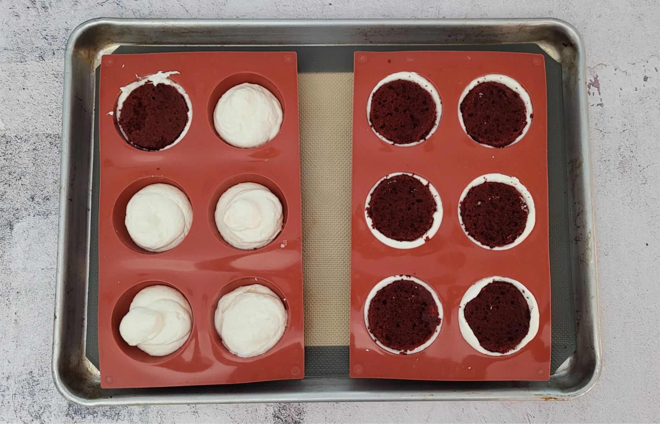 assembling twelve cakes in two half sphere silicone molds