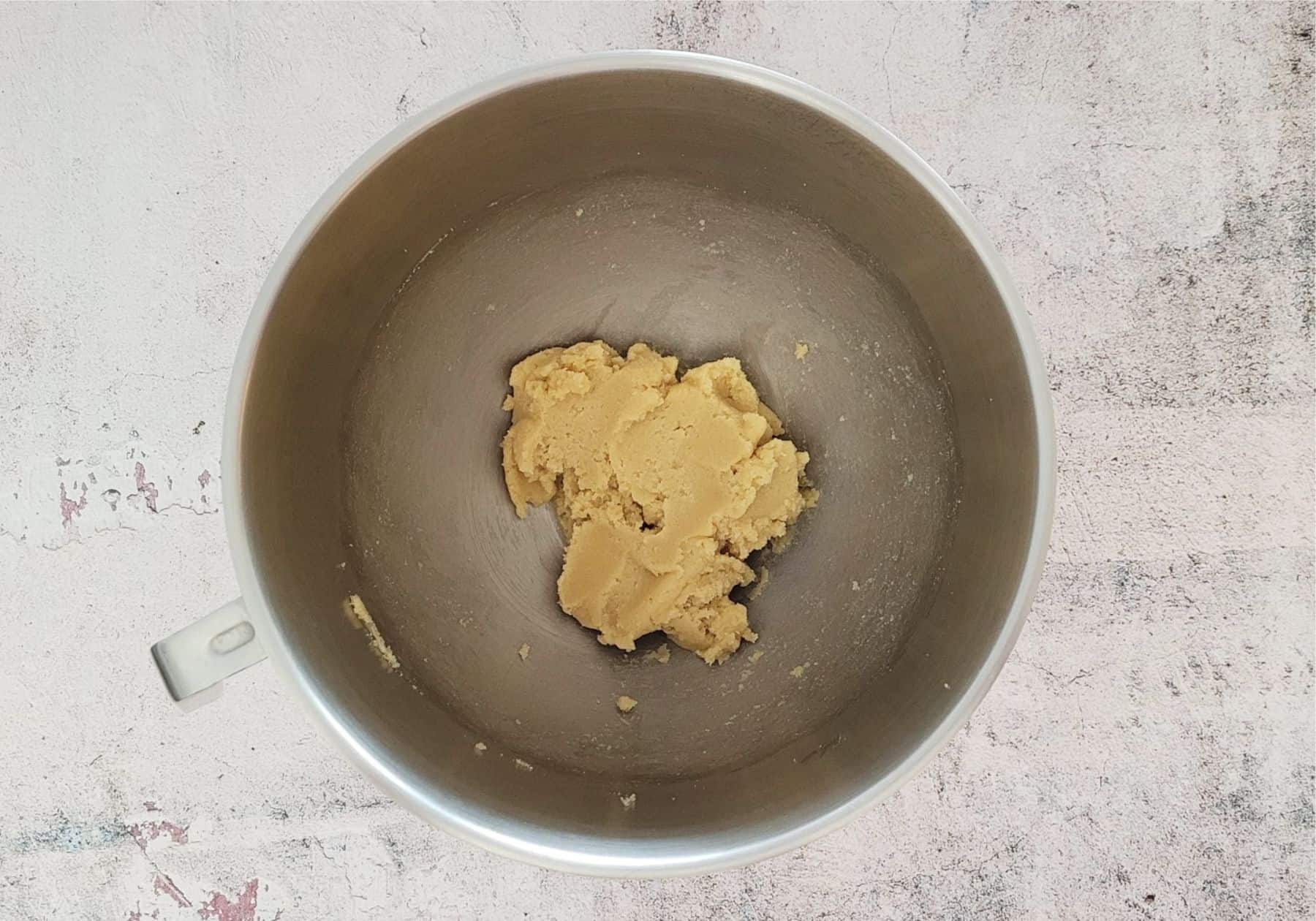 sugar and butter in mixing bowl after ingredients are creamed together