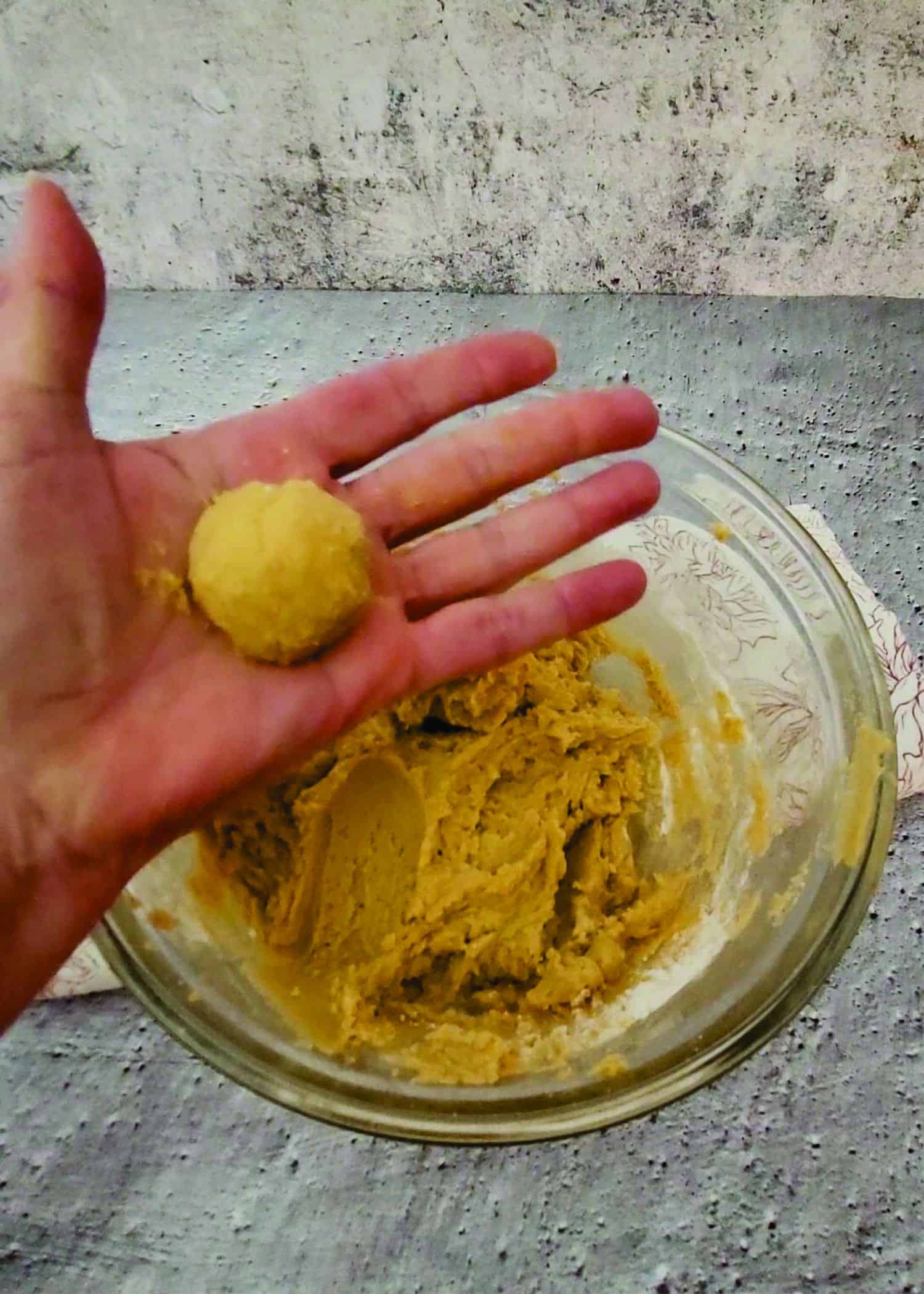 create a ball of peanut butter dough about one inch in diameter