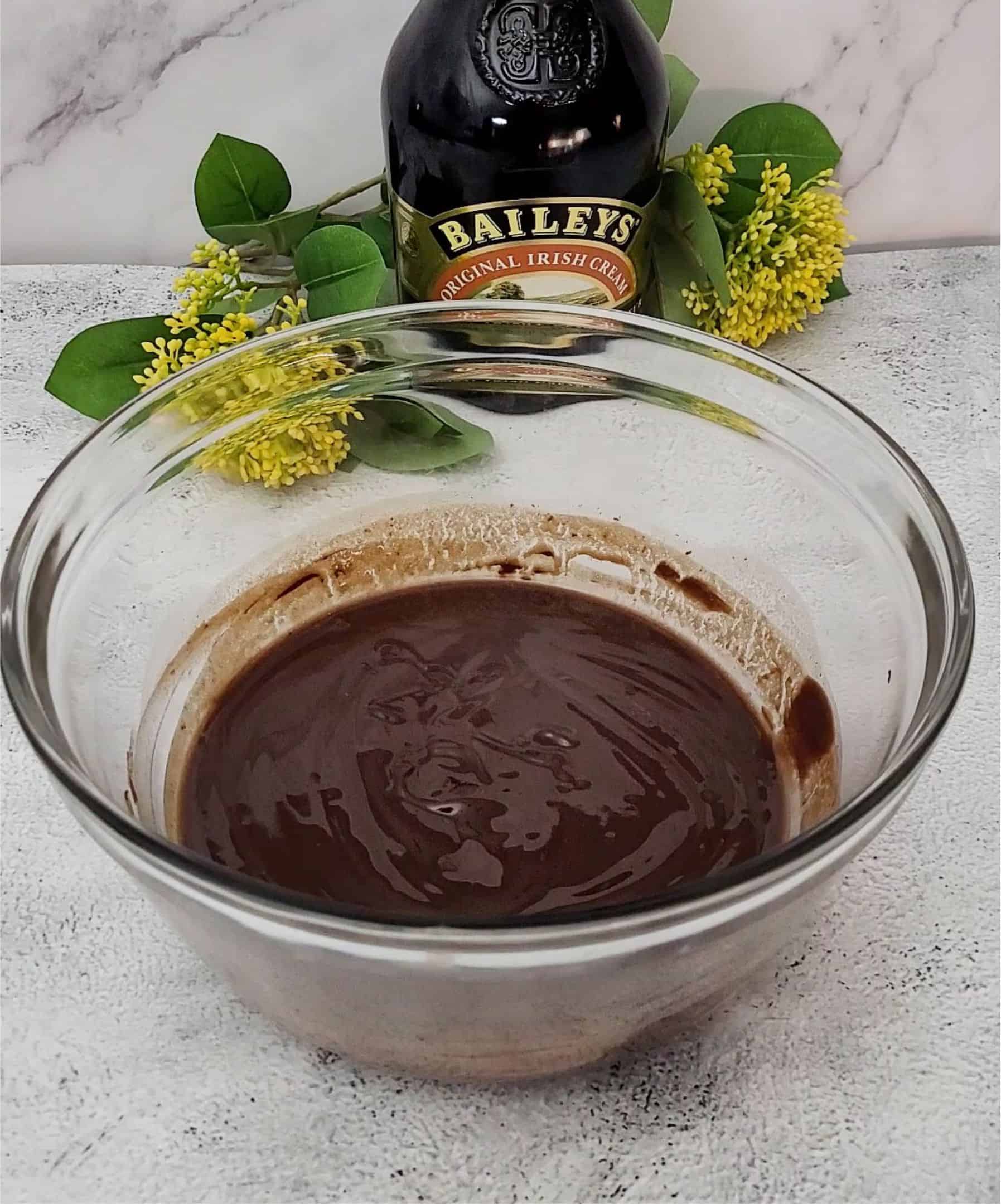 butter and chocolate melted together in a glass bowl