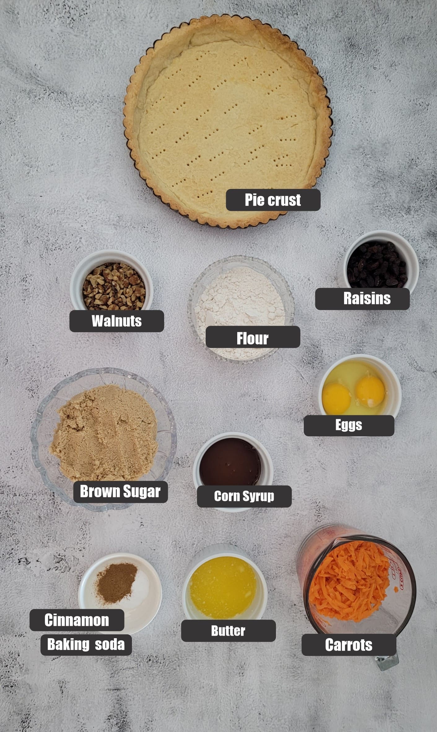 overhead view of all ingredients needed to make a carrot cake pie