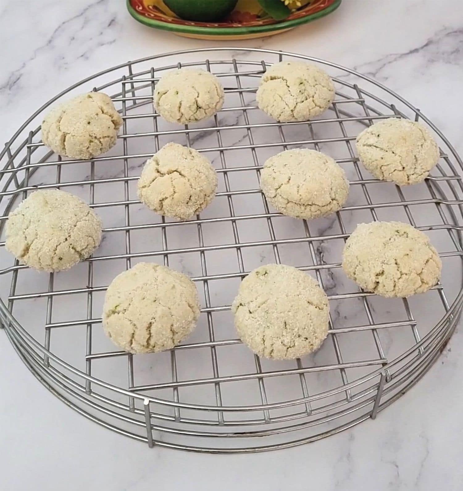 gluten free lime cookies cooling on a wire rack