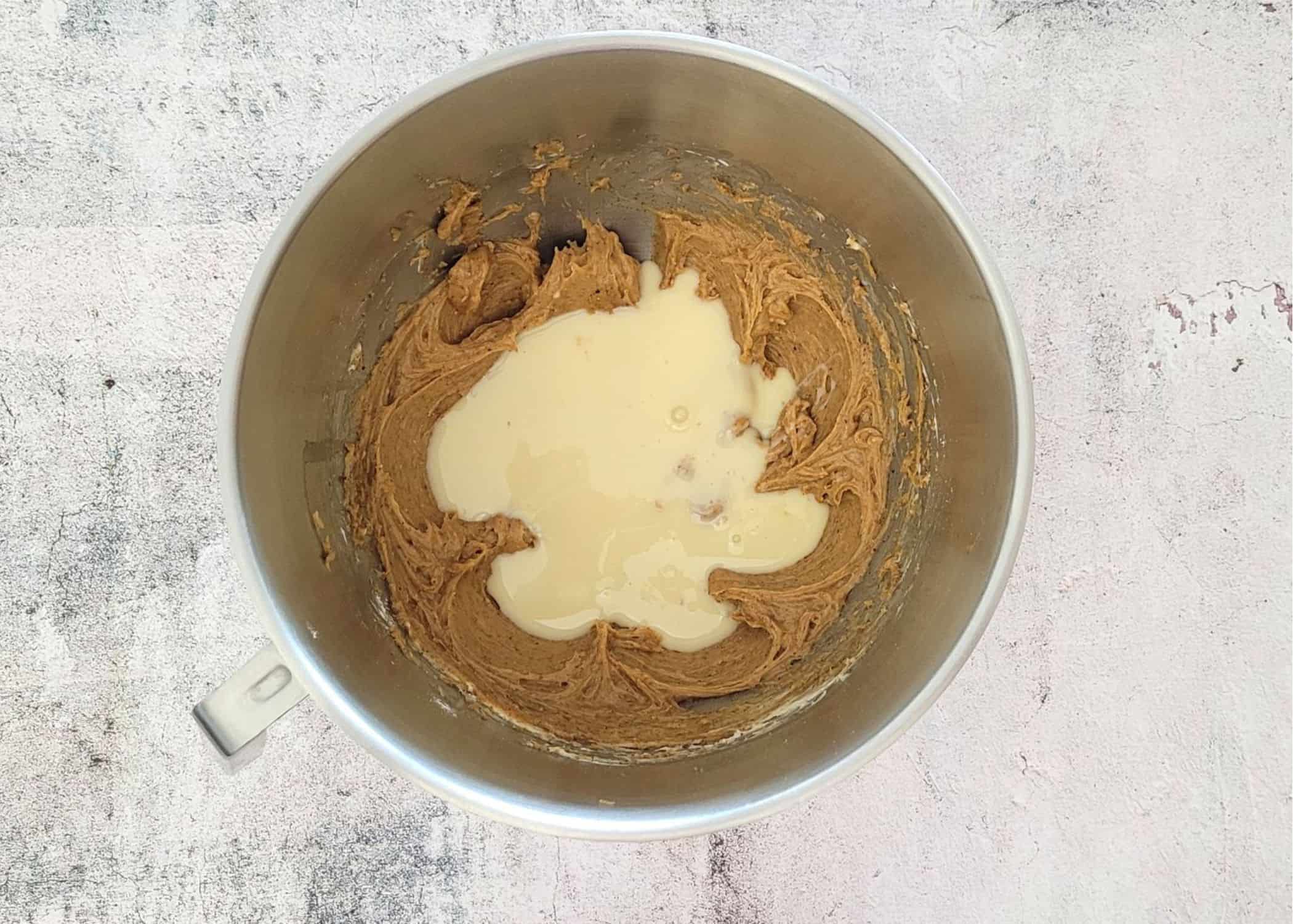 sweetened condensed milk added to mixing bowl for pie filling