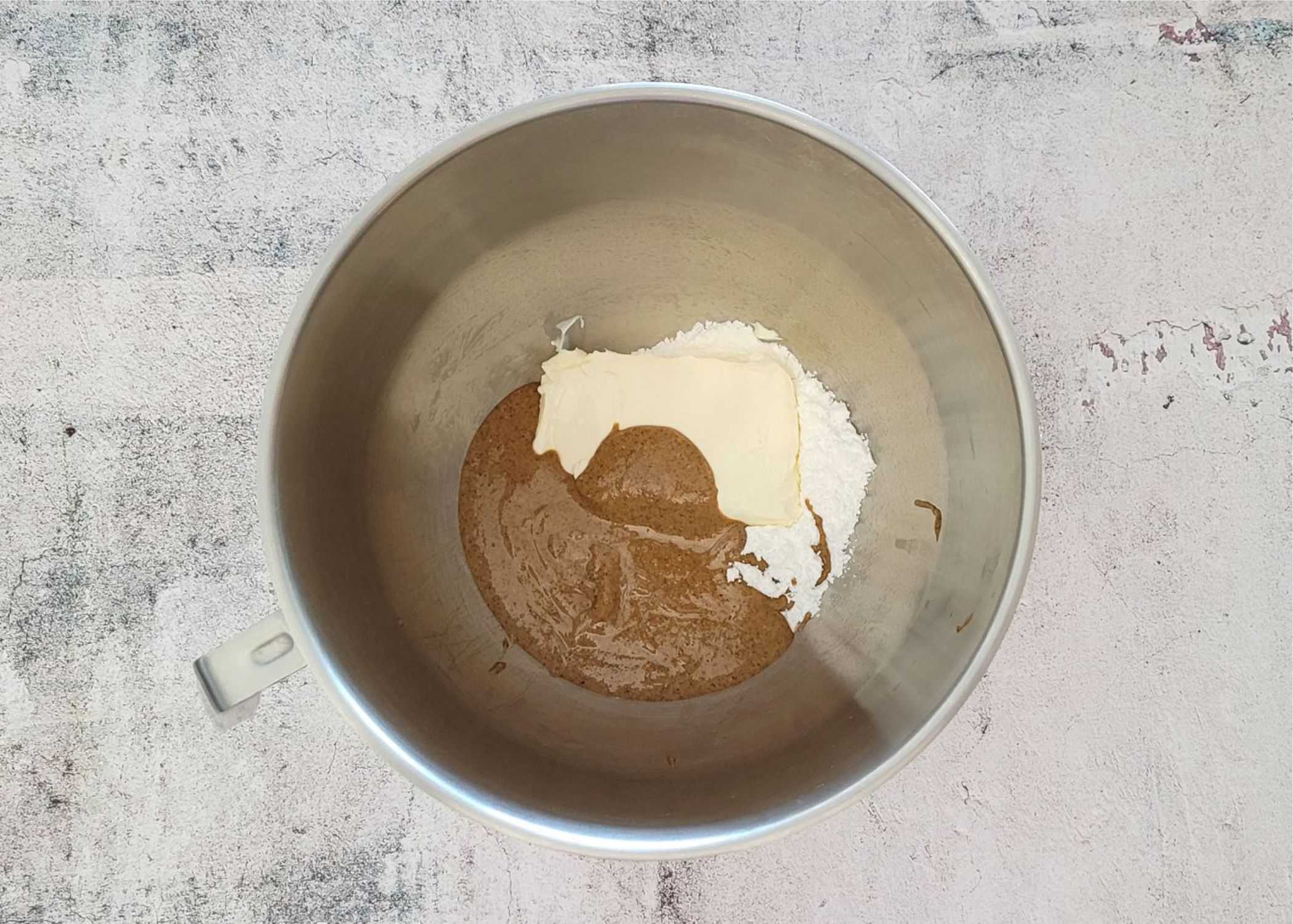 almond butter, cream cheese and powdered sugar in a mixing bowl