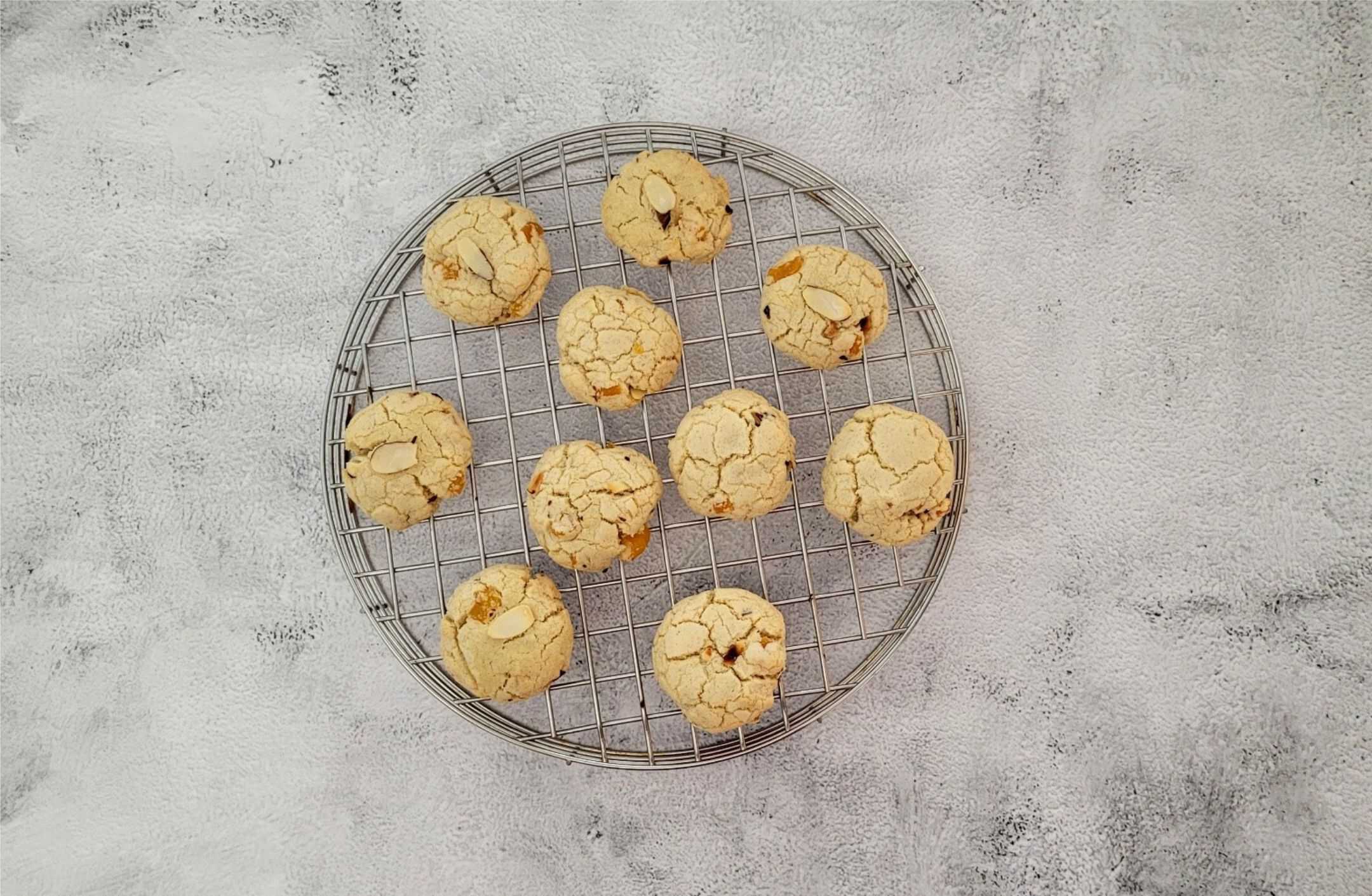 baked apricot almond cookies cooling on a wire rack