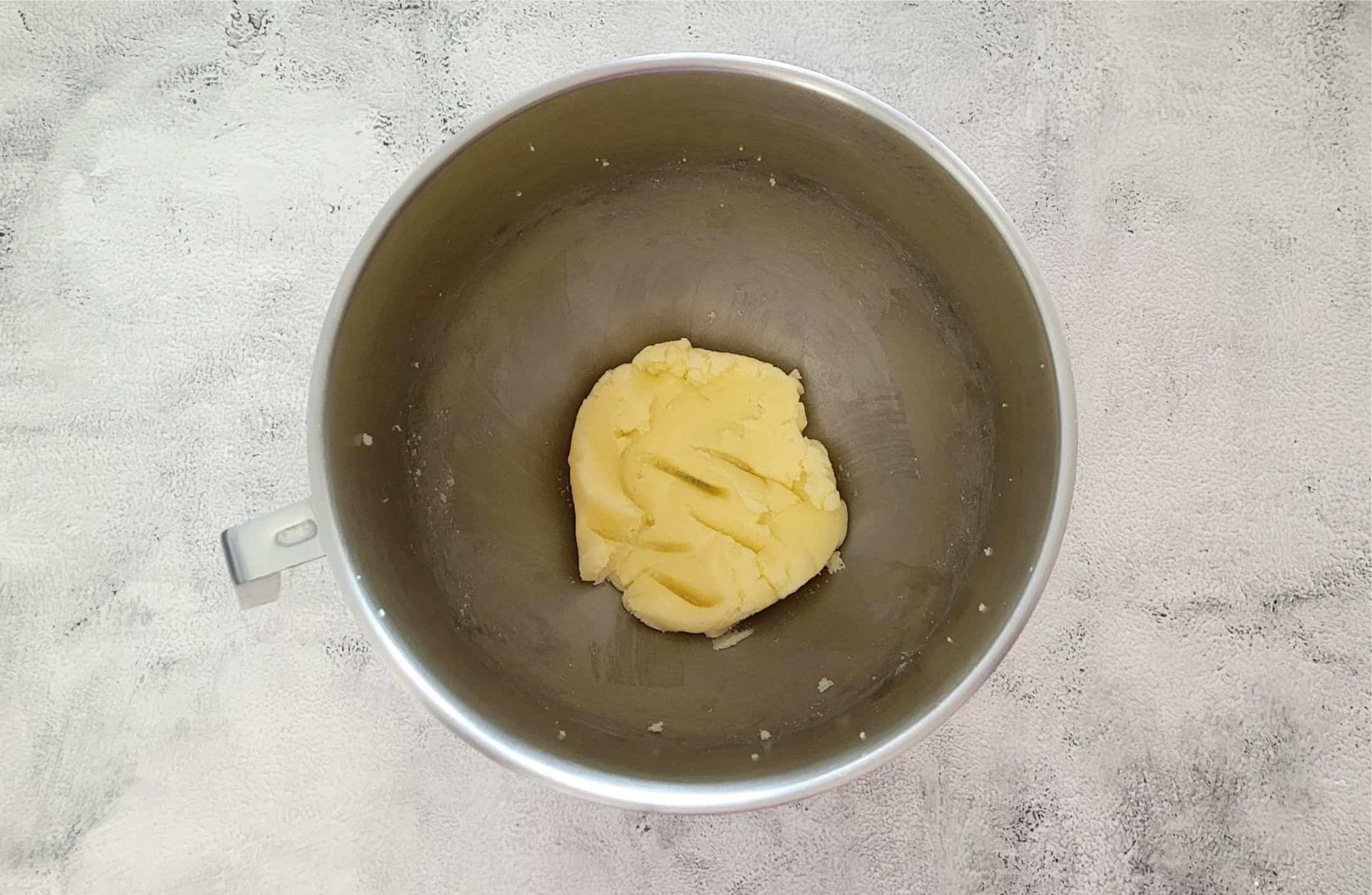 butter and sugar creamed together in a mixing bowl