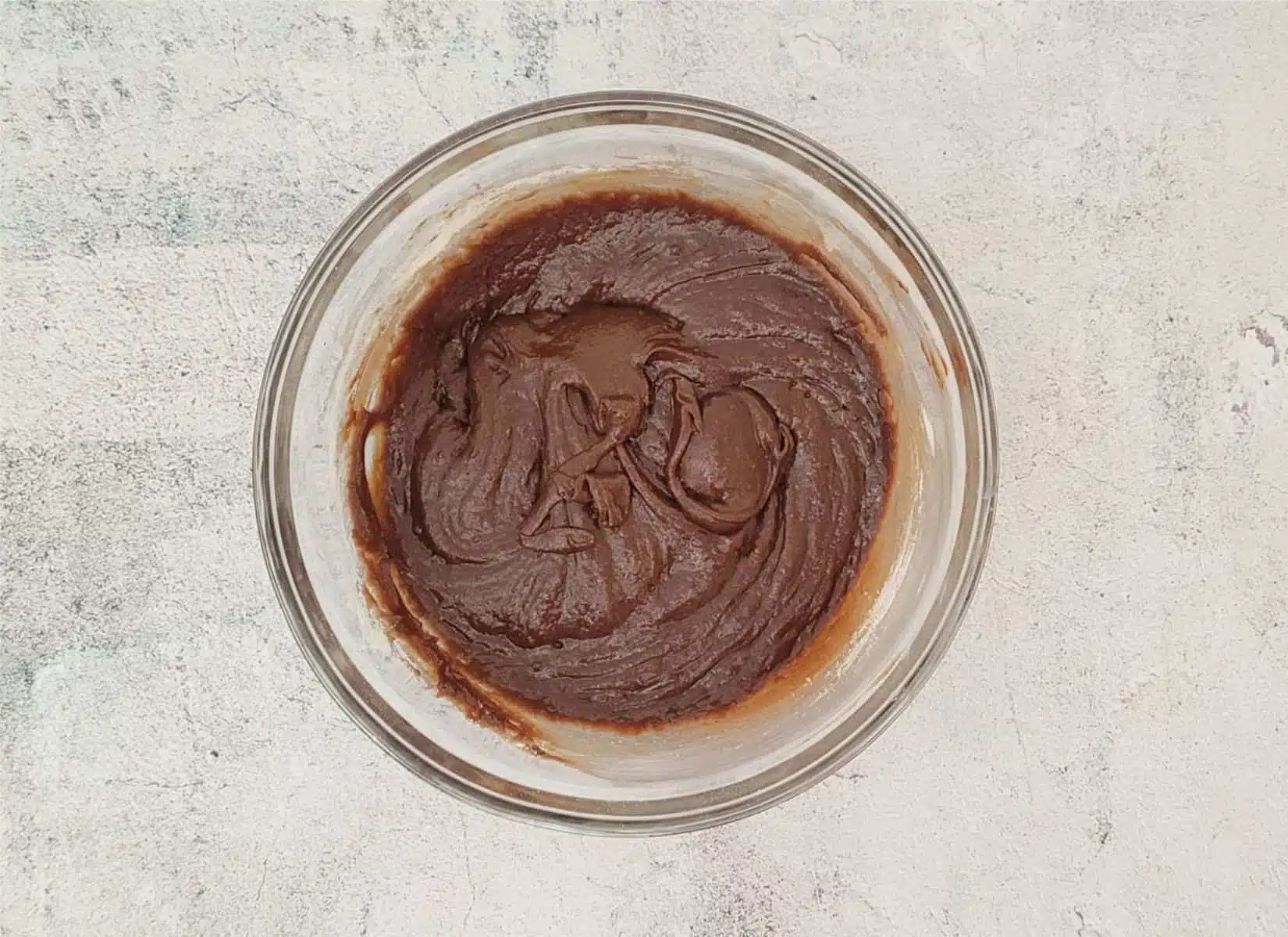 finished gluten free chocolate sour cream cookies dough in a mixing bowl