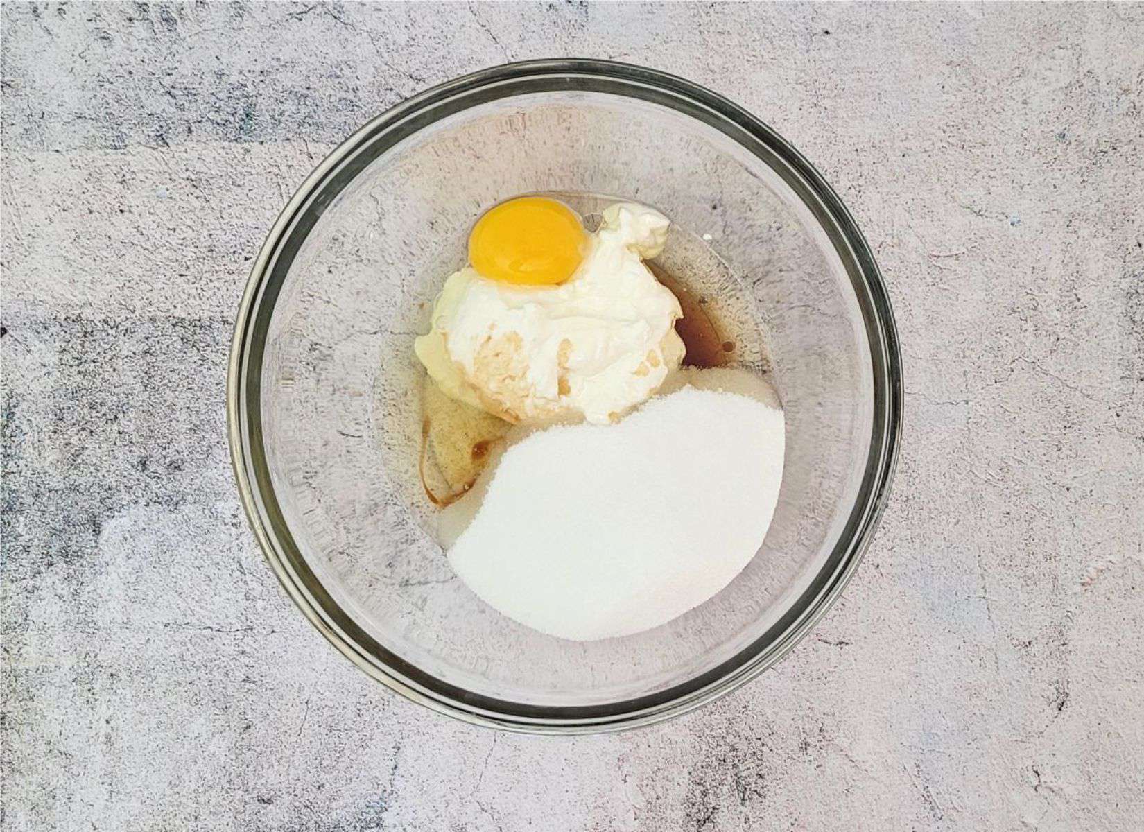 sour cream, egg, sugar, vanilla and oil in a mixing bowl
