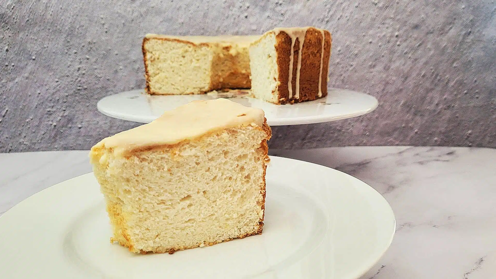 lemon angel food cake slice on a plate