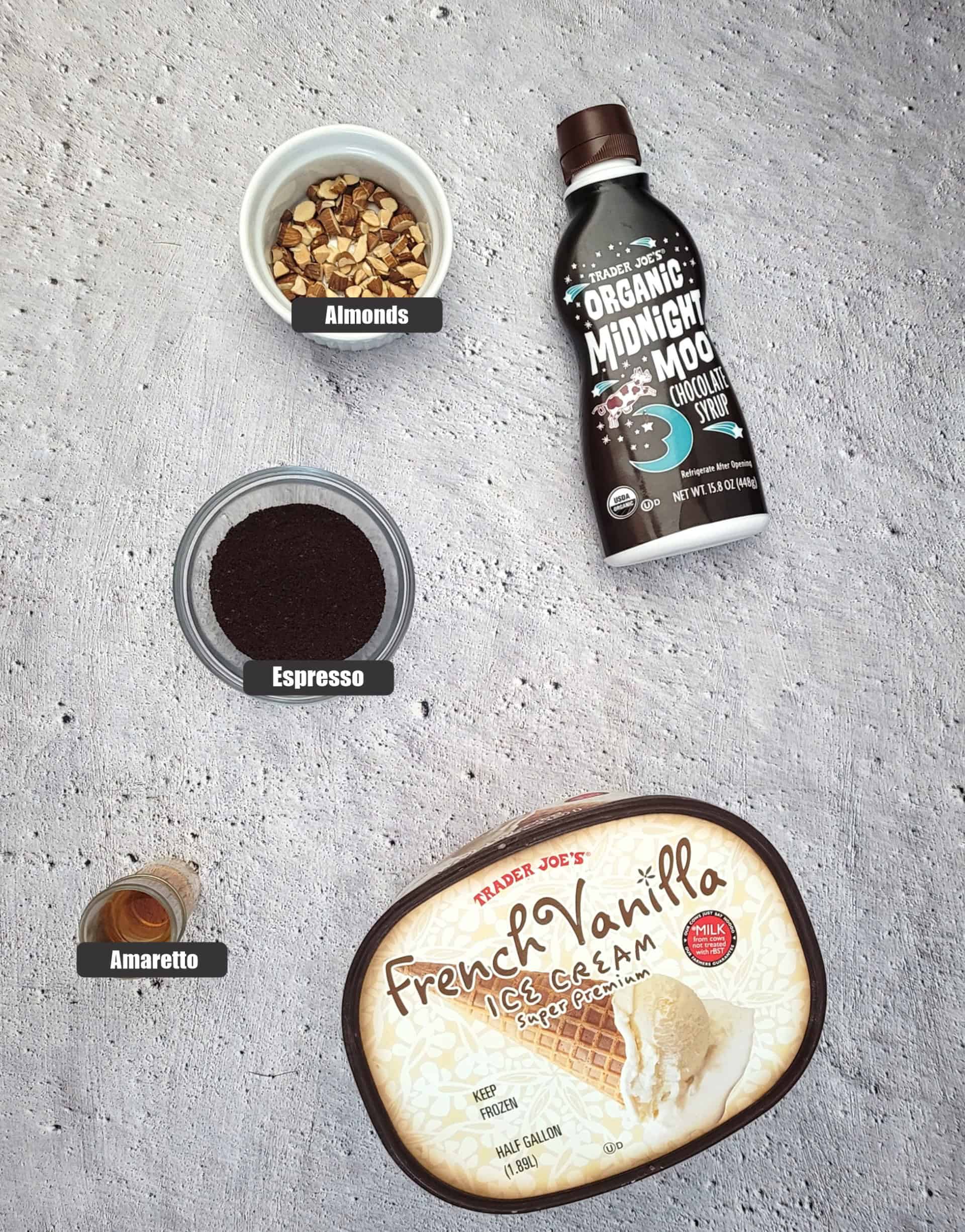 ingredients needed to make recipe including Amaretto, vanilla ice cream, espresso, chocolate sauce and toasted almond pieces