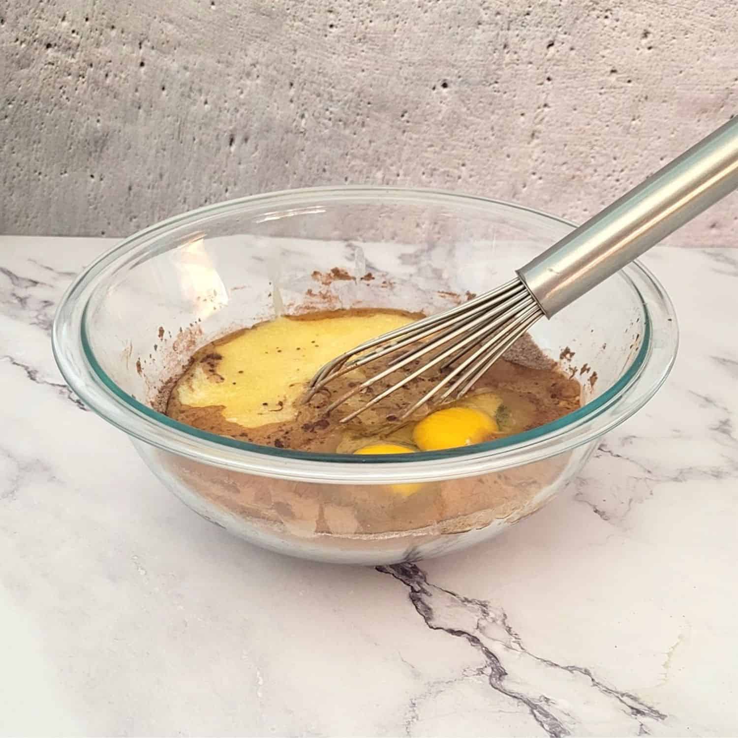 eggs, butter and evaporated milk adding to mixing bowl to make pie filling