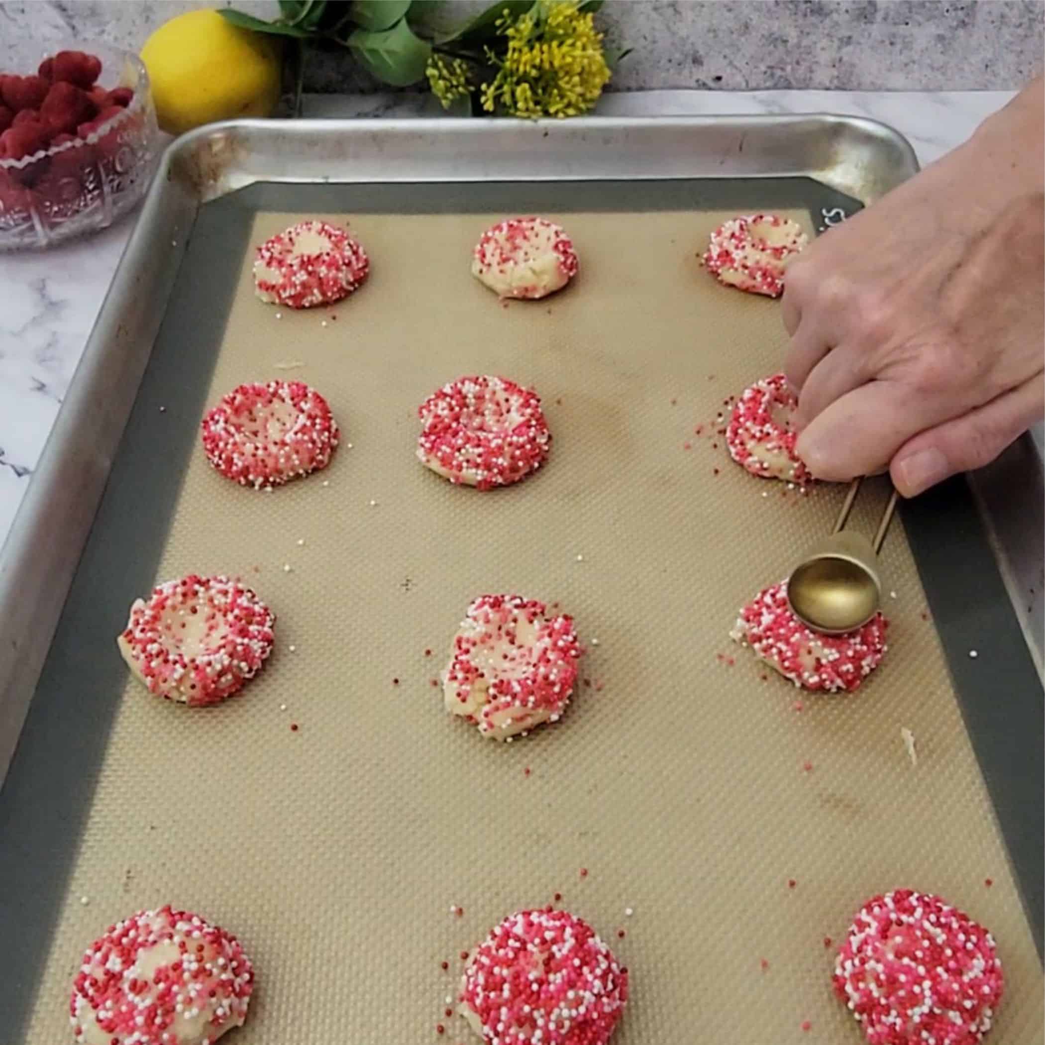 use a the back of a half teaspoon to make indentations in cookies before baking