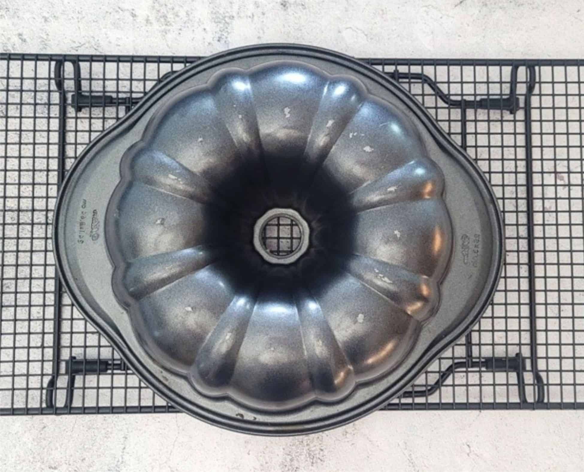 Bundt cake cooling on a wire rack after baking