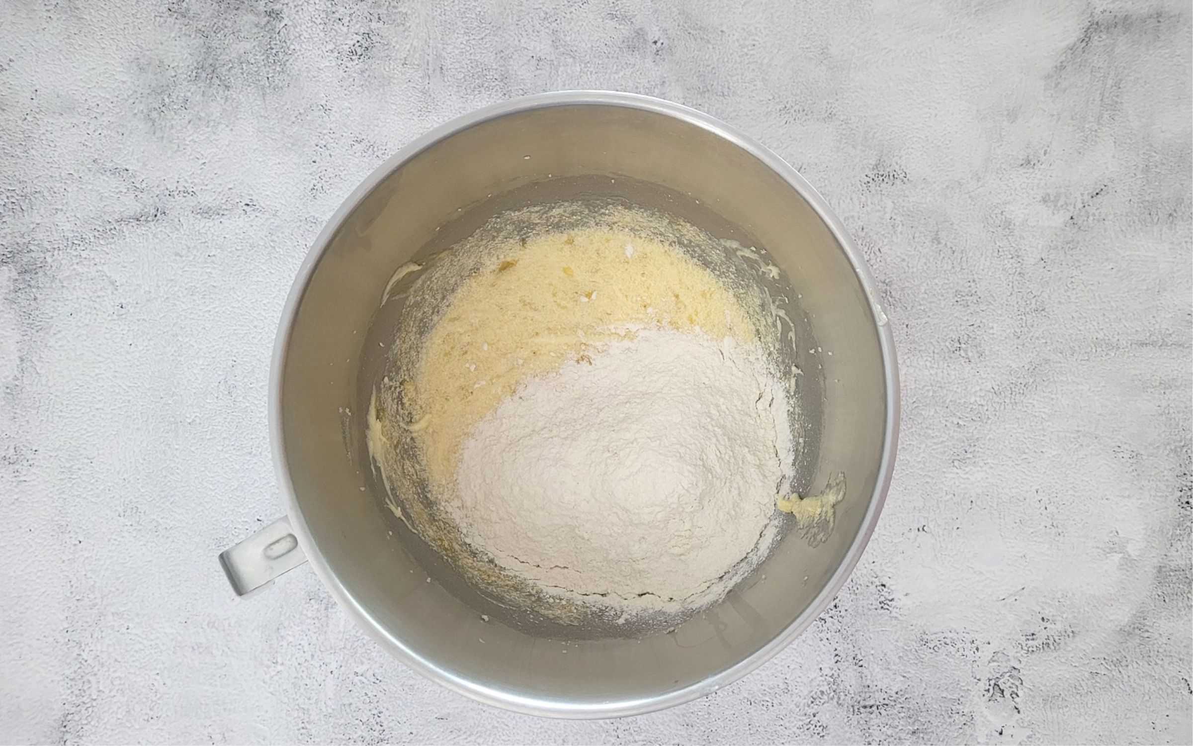 add dry ingredients and sour cream to the mixing bowl