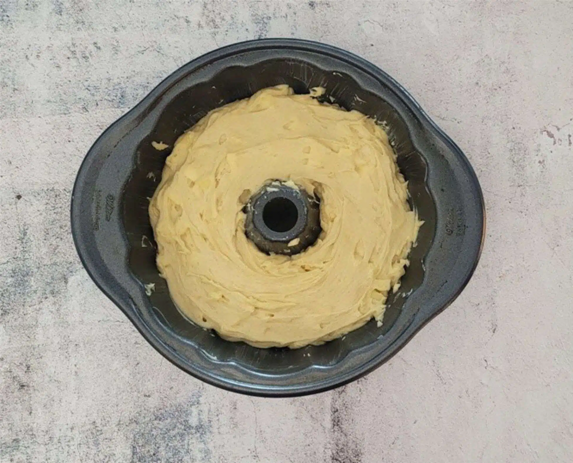 remaining cake batter added to Bundt pan