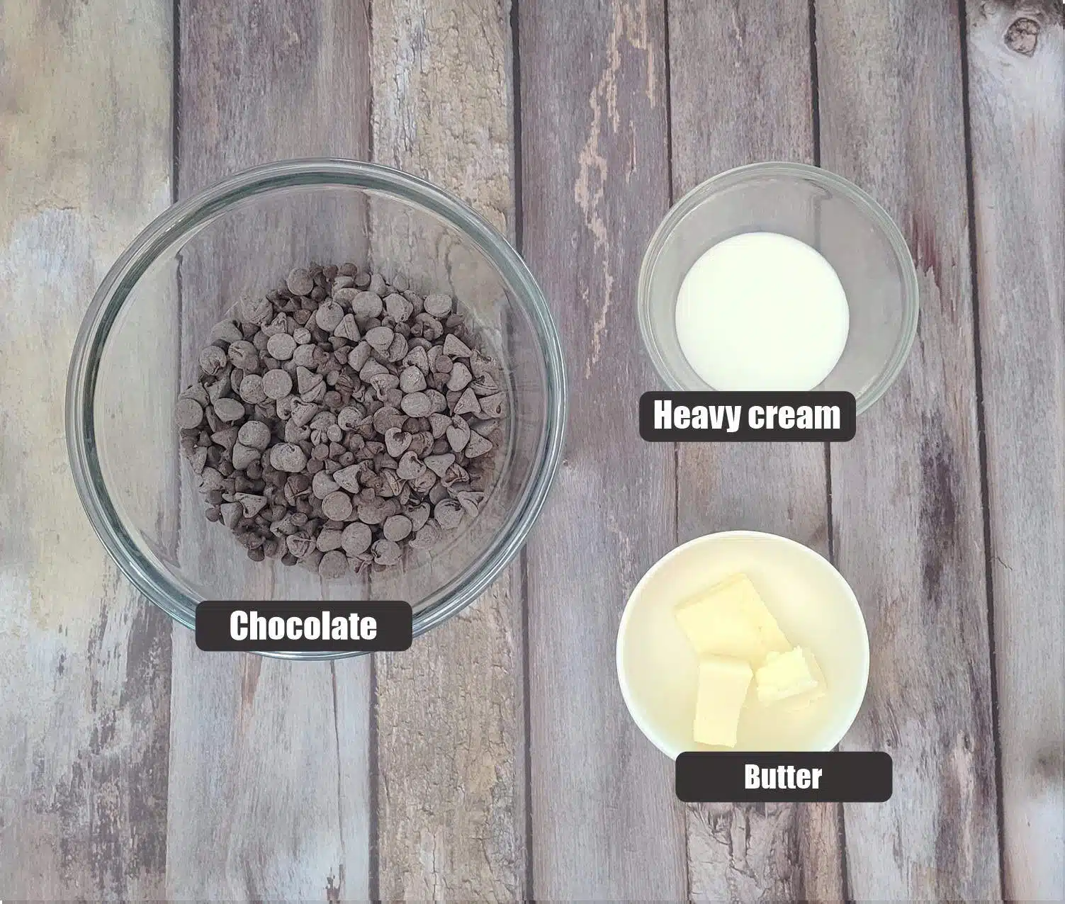 ingredients needed to make chocolate ganache filling including butter, heavy cream and chocolate