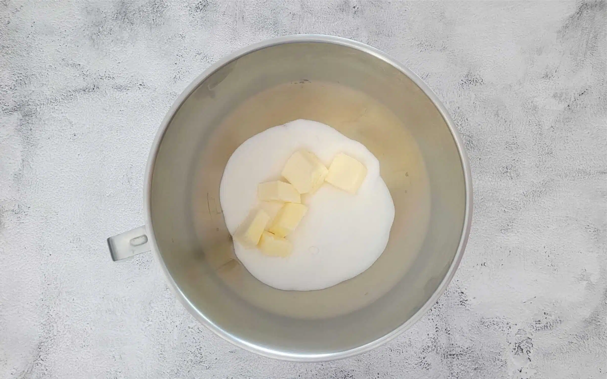 place butter and sugar in a mixing bowl and cream until light and fluffy