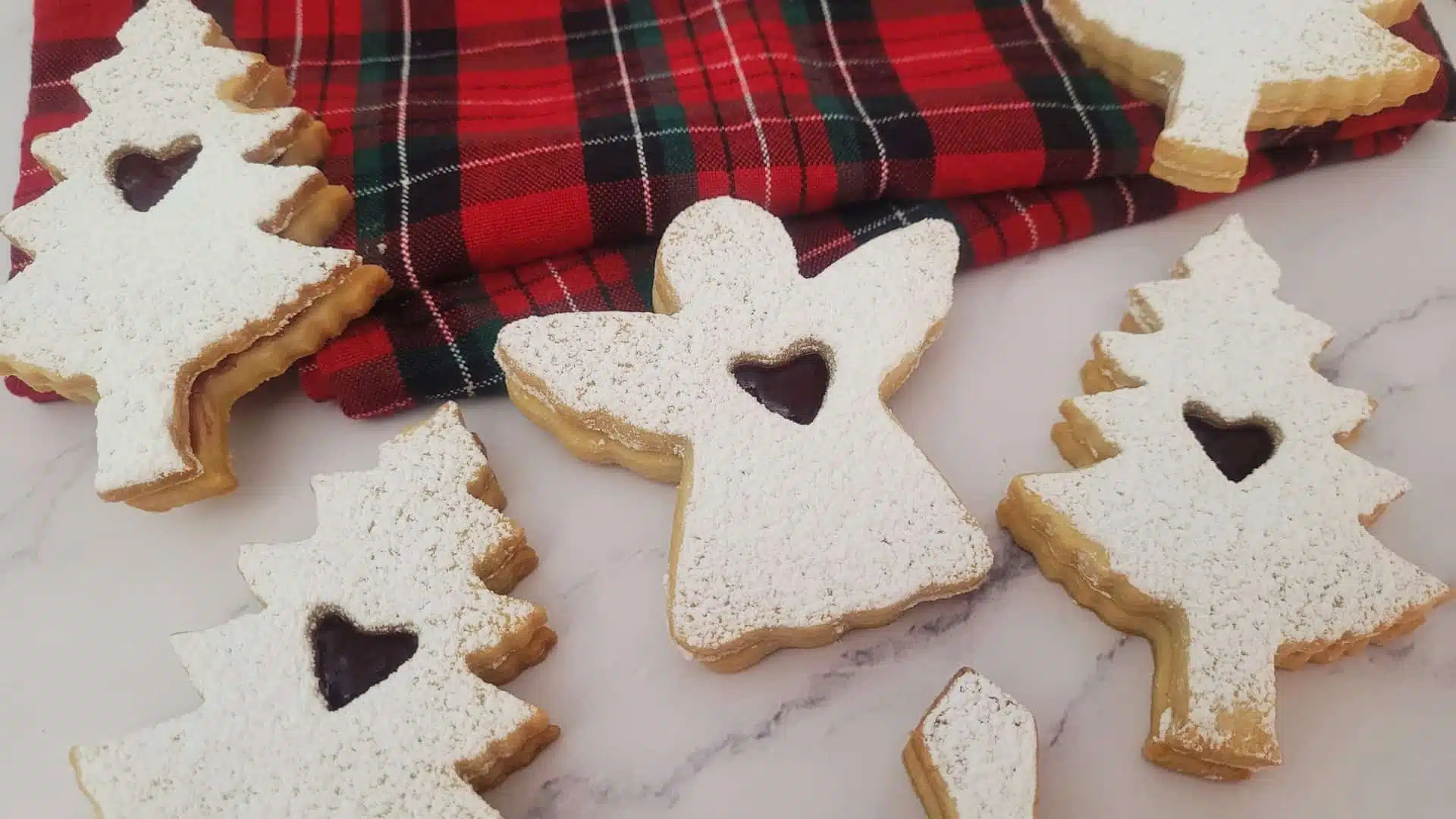 christmas tree and angel linzer cookies